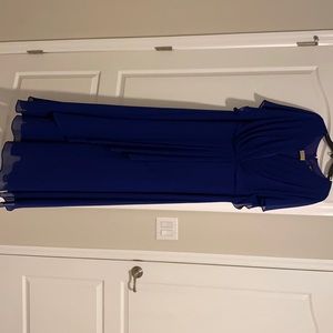 Evening gown with sleeve. flattering to any shape.